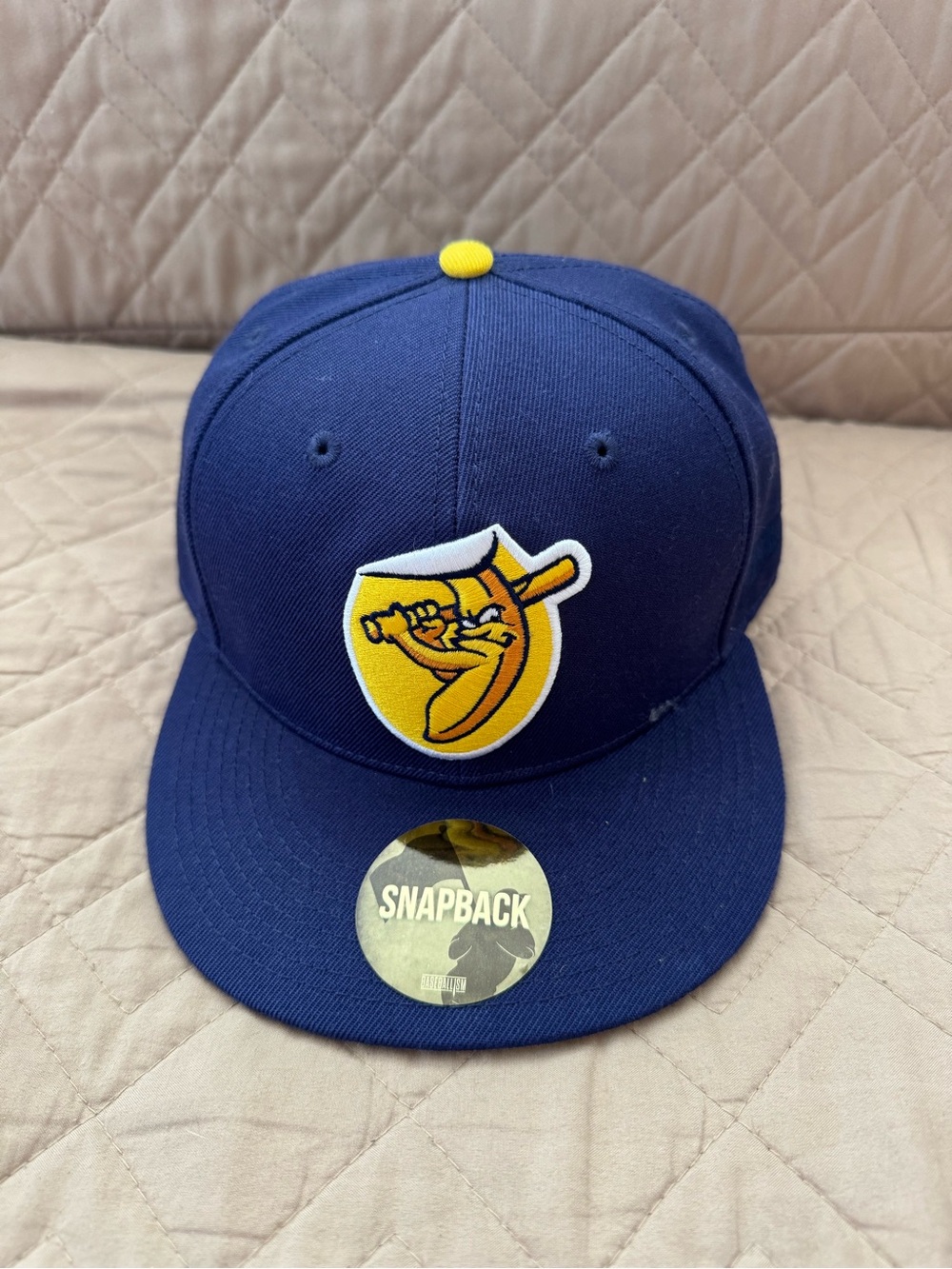 Savanna Bananas Adult Navy Snapback Cap with Yellow Logo Accent